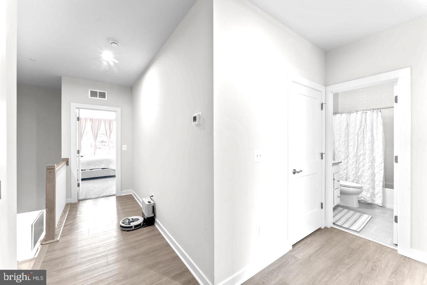 43785 Transit Square Ashburn, VA 20147 - Photo 20 of 40 a view of a living room and hardwood floor