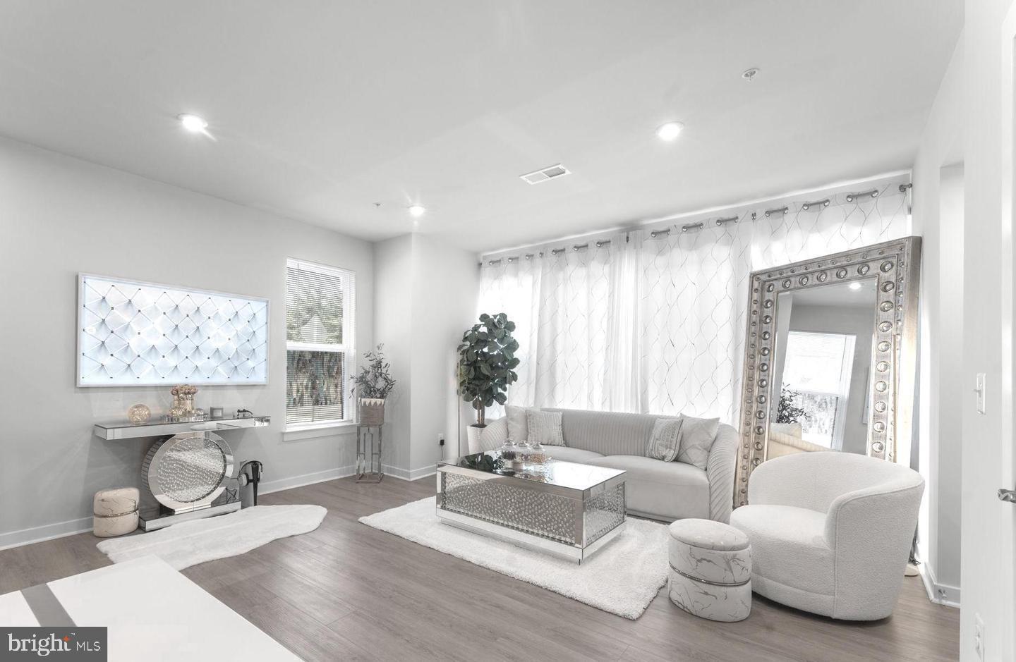 43785 Transit Square Ashburn, VA 20147 - Photo 2 of 40 a living room with furniture and a large window