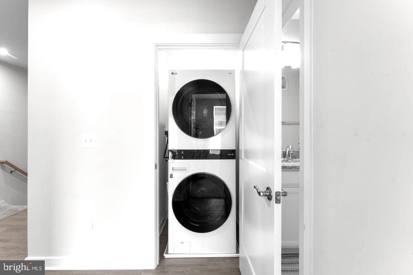 43785 Transit Square Ashburn, VA 20147 - Photo 26 of 40 a view of a hallway with washer and dryer