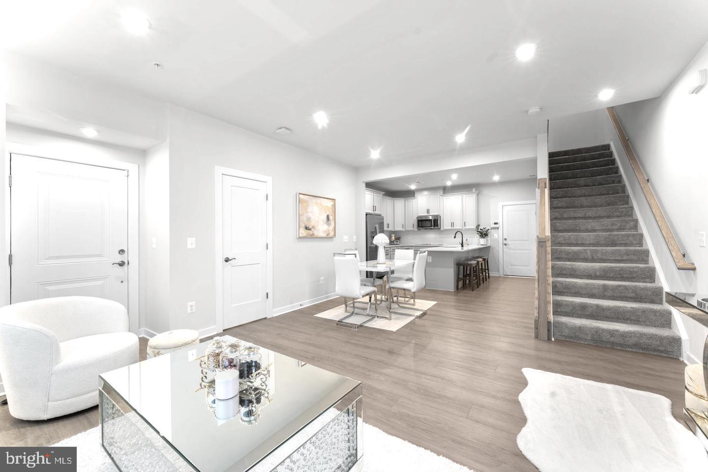 43785 Transit Square Ashburn, VA 20147 - Photo 3 of 40 a living room with furniture and wooden floor