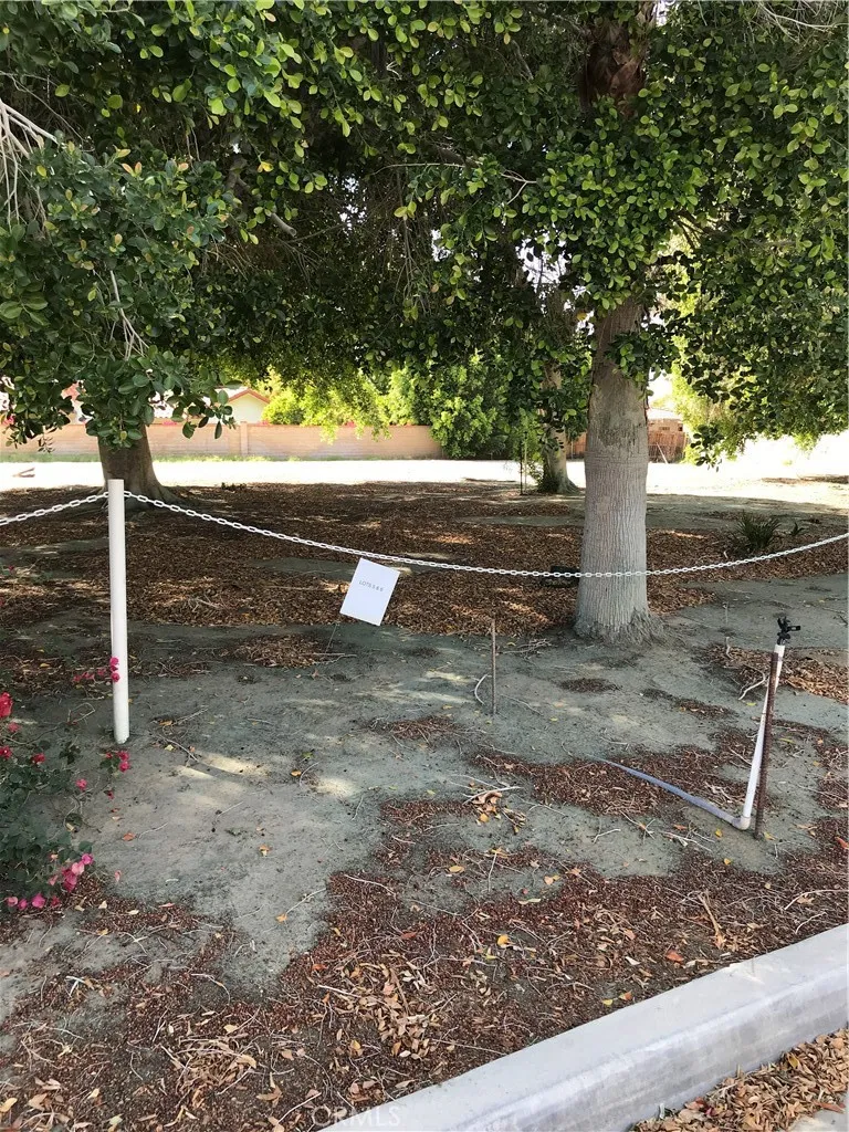 0 Adams Indio, CA 92203 - Photo 3 of 5 a view of a yard with wooden fence