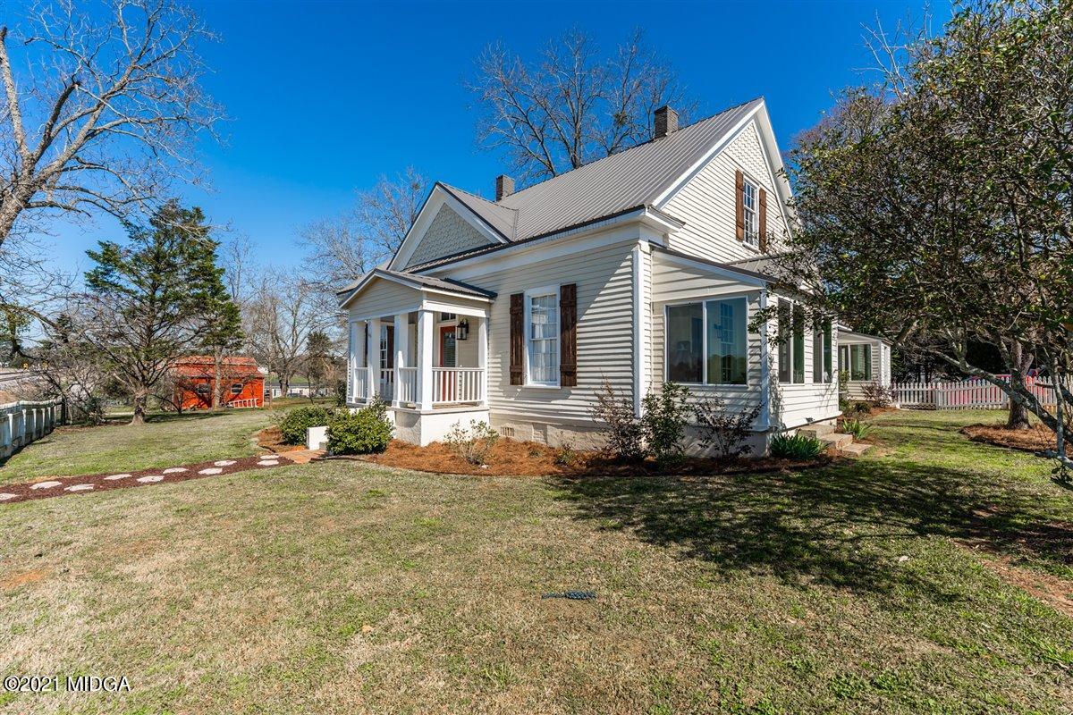 96 Gose Road Forsyth, GA 31029 - Photo 1 of 38 a view of a house with backyard and sitting area