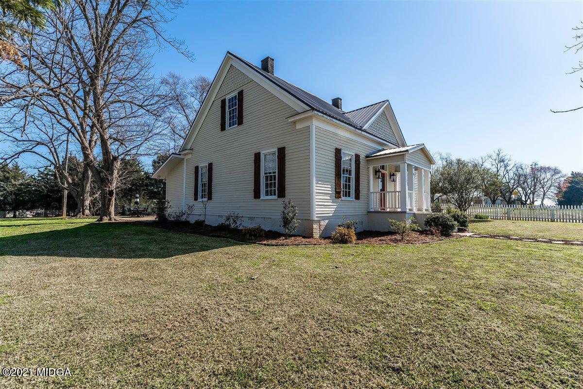 96 Gose Road Forsyth, GA 31029 - Photo 2 of 38 a view of a house with a yard