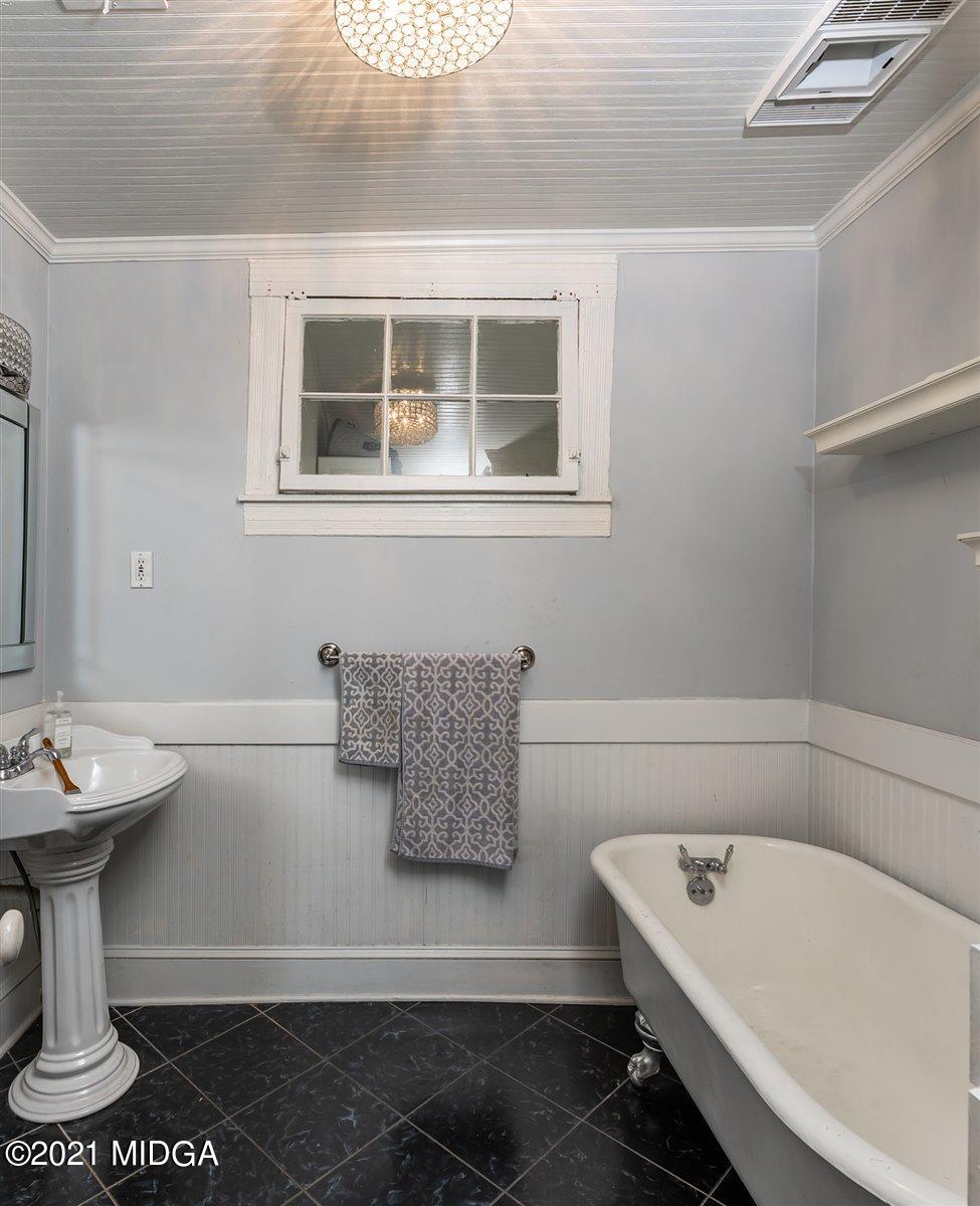 96 Gose Road Forsyth, GA 31029 - Photo 14 of 38 a bathroom with a sink and mirror