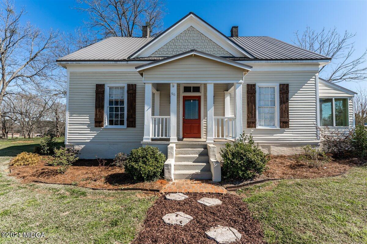 96 Gose Road Forsyth, GA 31029 - Photo 3 of 38 a view of a house with a small yard and plants