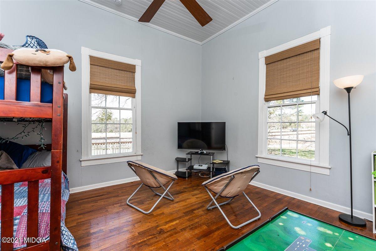 96 Gose Road Forsyth, GA 31029 - Photo 22 of 38 a living room with furniture and a window