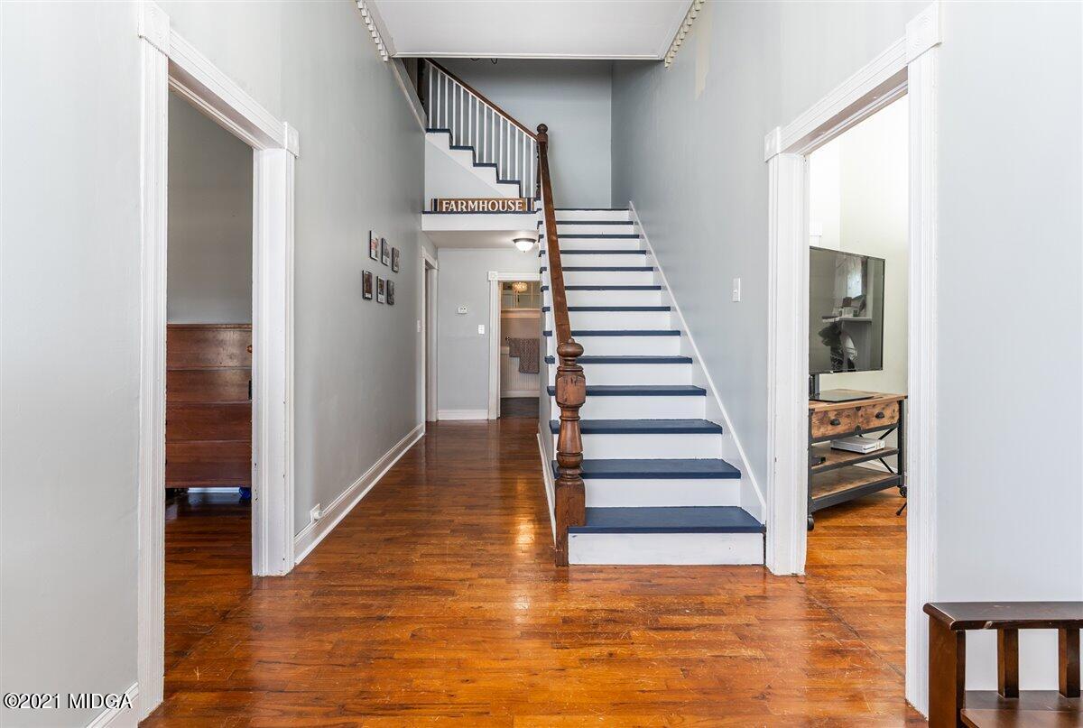96 Gose Road Forsyth, GA 31029 - Photo 24 of 38 a view of entryway and hall with wooden floor