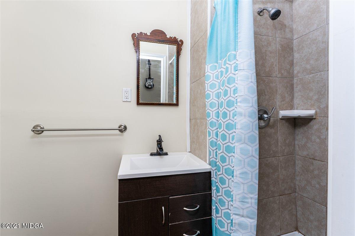 96 Gose Road Forsyth, GA 31029 - Photo 31 of 38 a bathroom with a sink and mirror