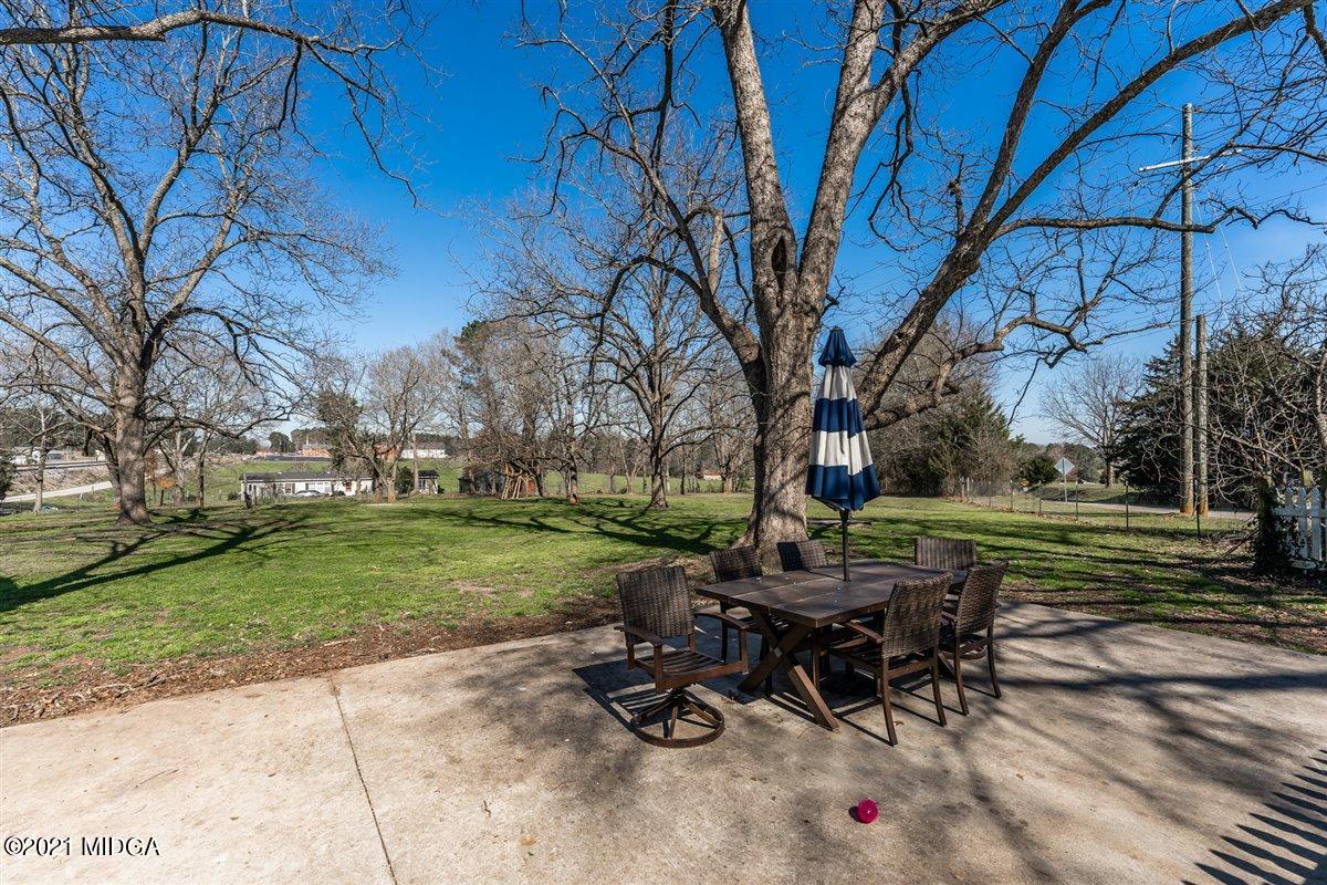 96 Gose Road Forsyth, GA 31029 - Photo 34 of 38 a view of a backyard with sitting area