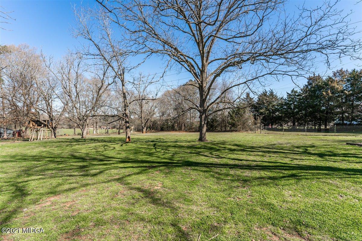 96 Gose Road Forsyth, GA 31029 - Photo 35 of 38 a view of a golf course with a trees