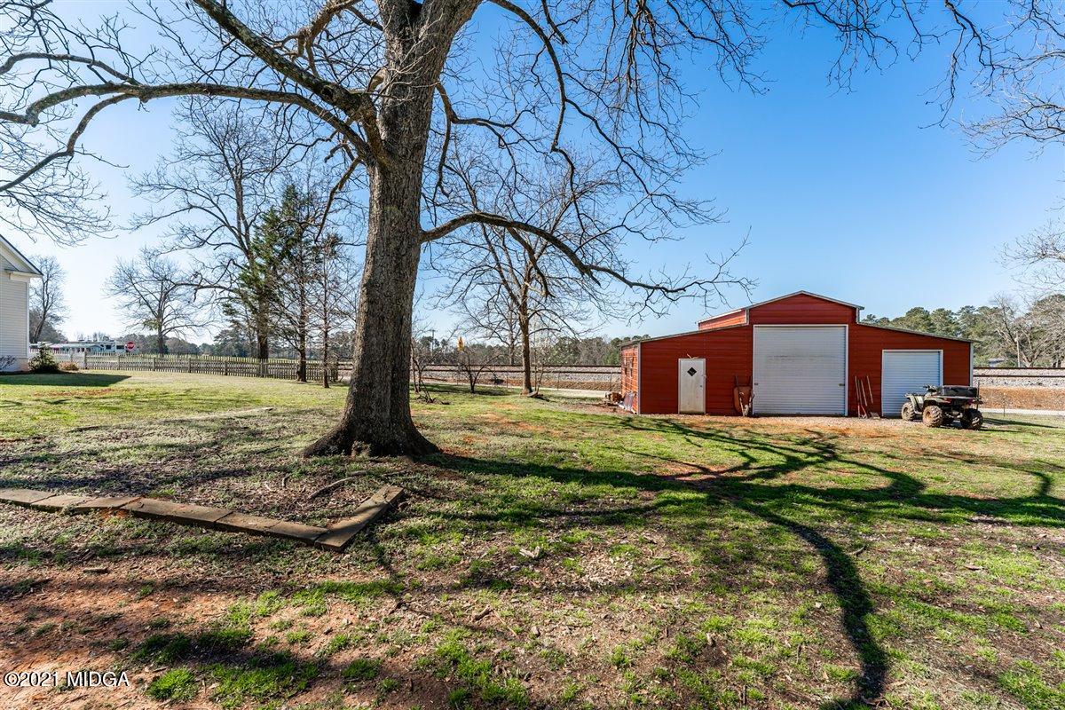 96 Gose Road Forsyth, GA 31029 - Photo 36 of 38 a view of a house with a yard