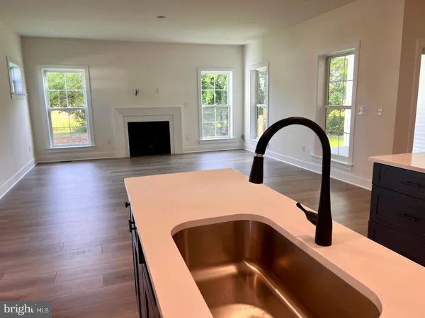 a bedroom with a bed and a fireplace