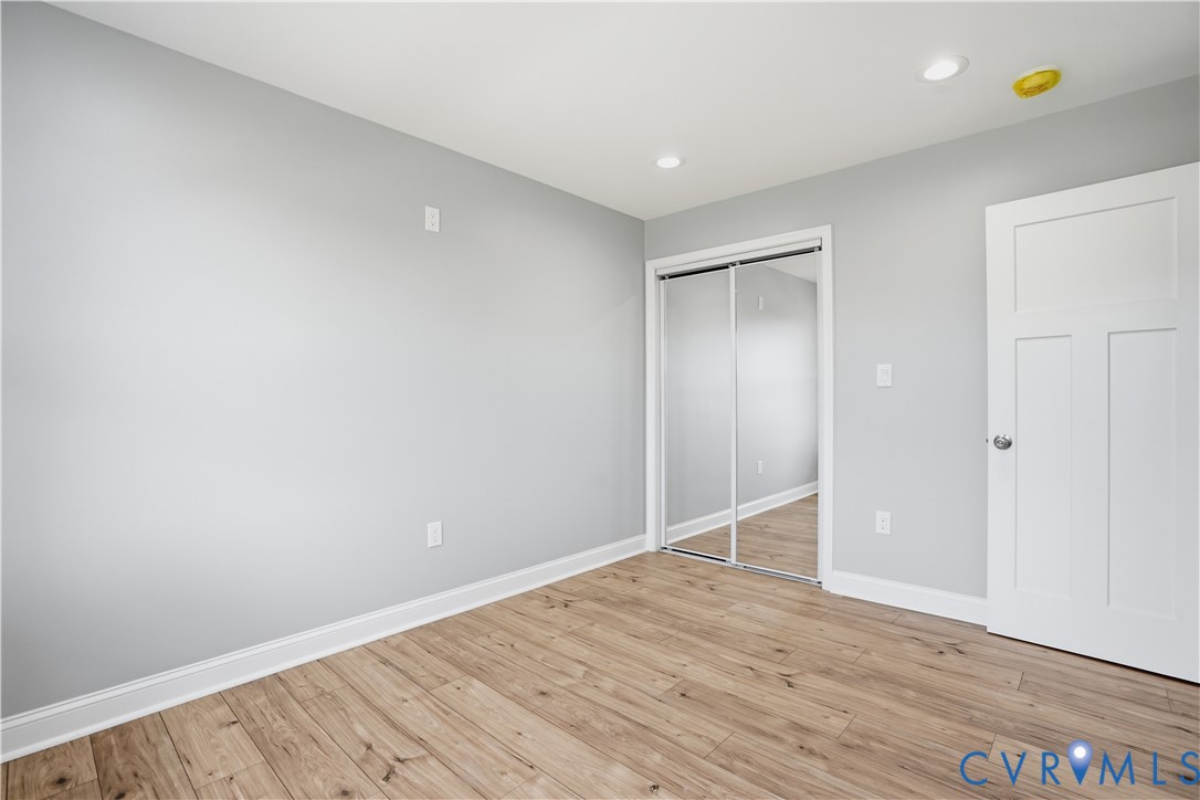 7839 King William Road Aylett, VA 23009 - Photo 28 of 38 a view of an empty room with wooden floor