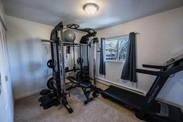 a view of a room with gym equipment