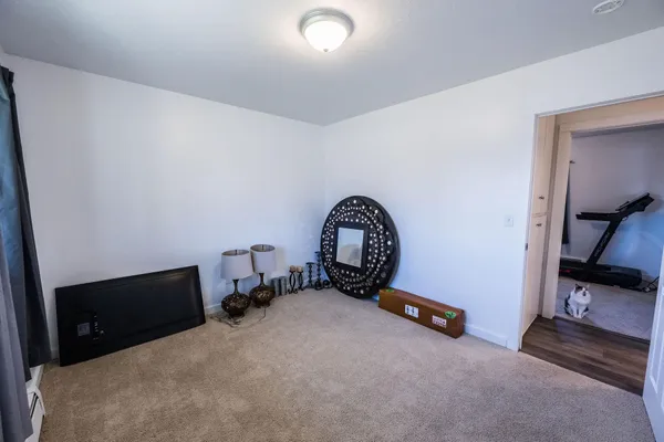 a view of room with workspace and mirror