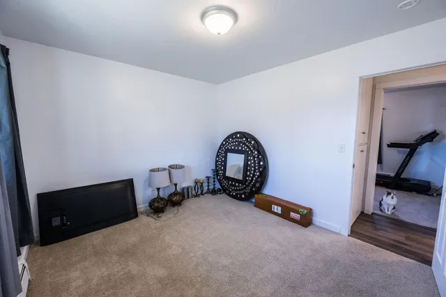 a view of room with workspace and mirror