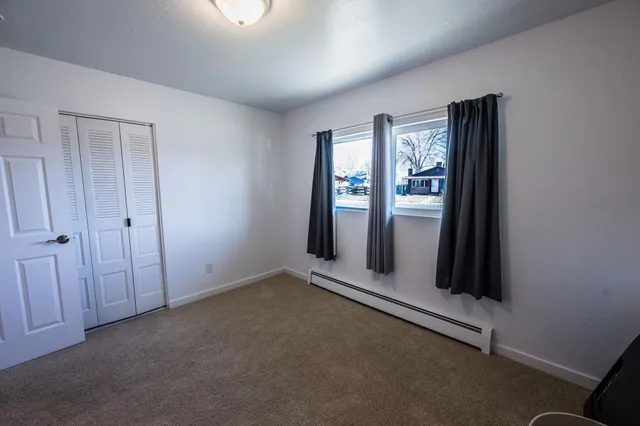 an empty room with windows