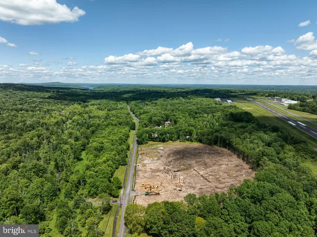 a view of a lake with a mountain in the background