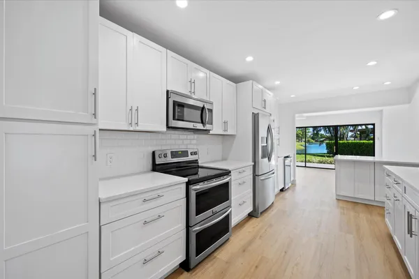 $8,000 | 13297 Garth Court, Palm Beach Gardens, FL 33418