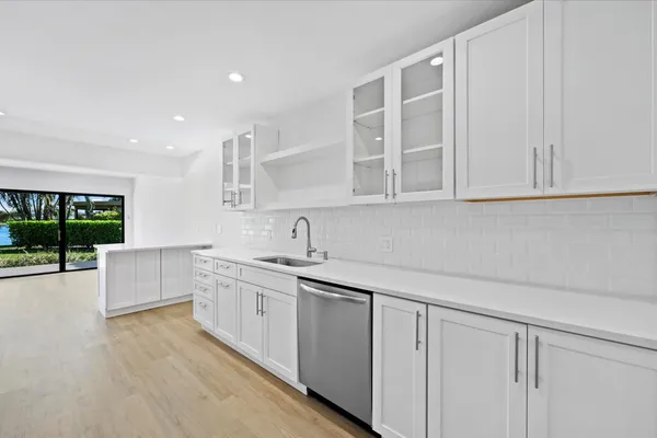 $8,000 | 13297 Garth Court, Palm Beach Gardens, FL 33418