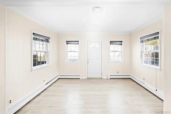 an empty room with windows