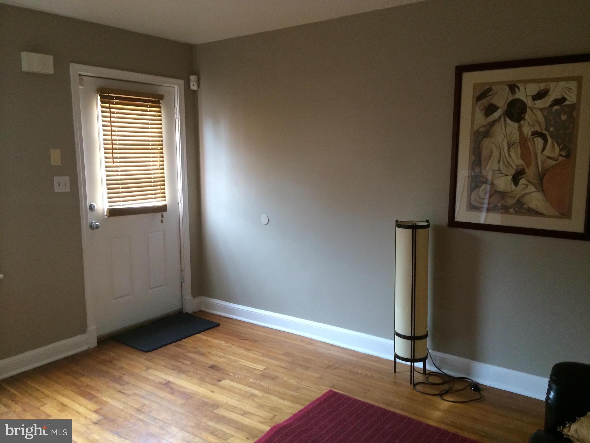 1226 Simms Place Northeast Washington, DC 20002 - Photo 5 of 15 a view of a room with gym equipment