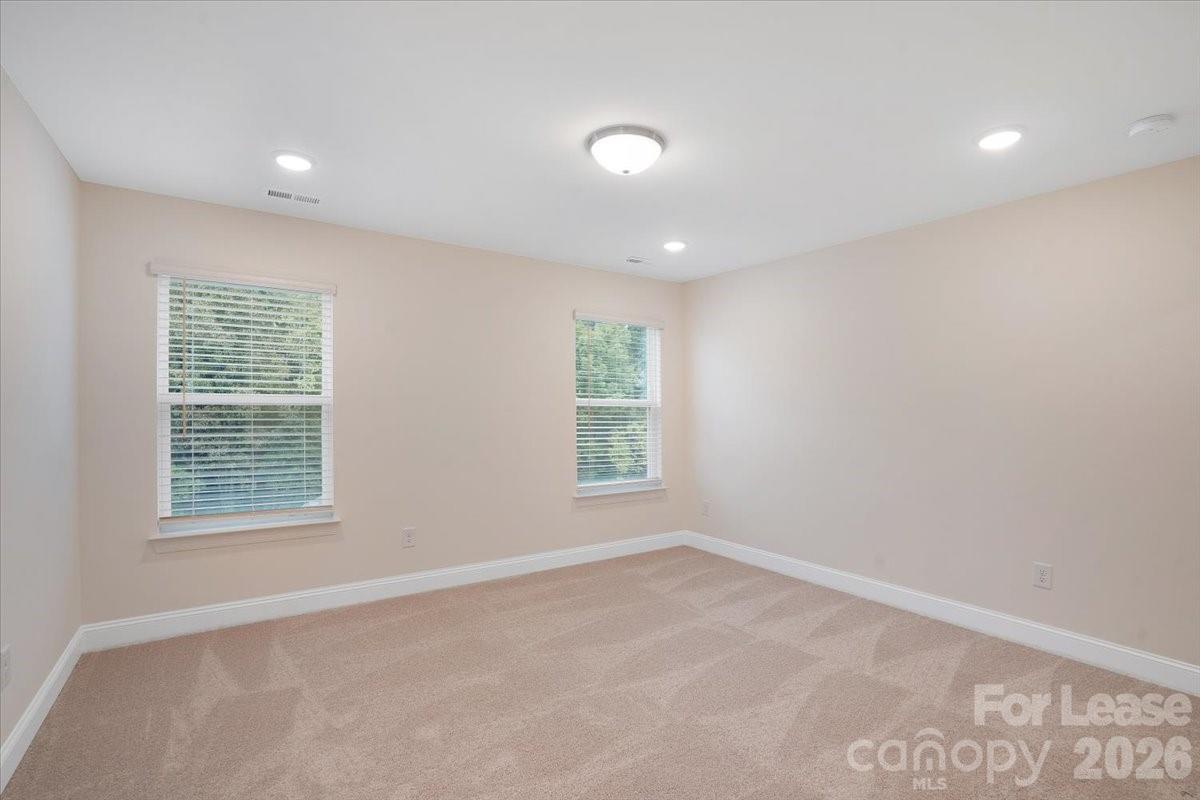5569 Stafford Road Charlotte, NC 28215 - Photo 17 of 29 an empty room with a window