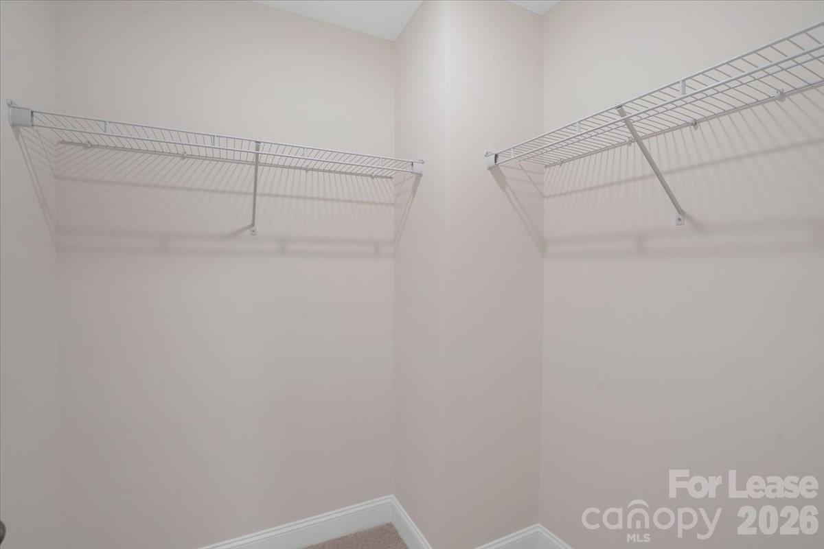 5569 Stafford Road Charlotte, NC 28215 - Photo 26 of 29 a view of a room with racks on the wall