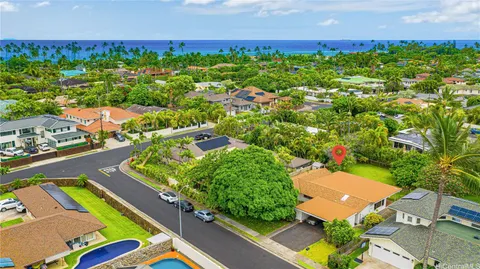 an aerial view of a house with a garden