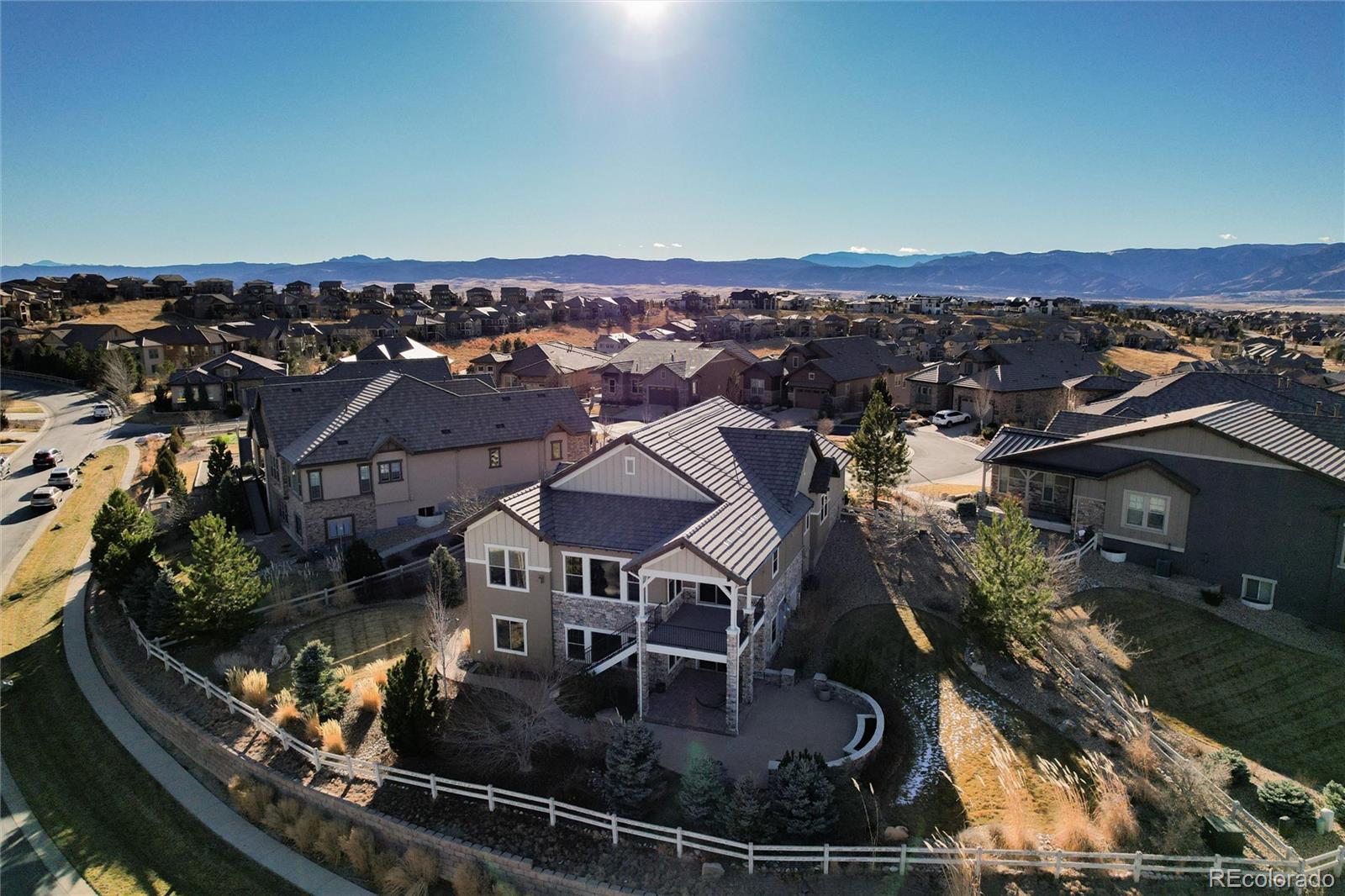 10698 Mountaingate Court Highlands Ranch, CO 80126 - Photo 30 of 47 an aerial view of residential houses with outdoor space