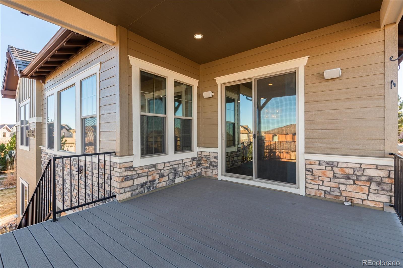 10698 Mountaingate Court Highlands Ranch, CO 80126 - Photo 37 of 47 a view of an entryway with wooden floor