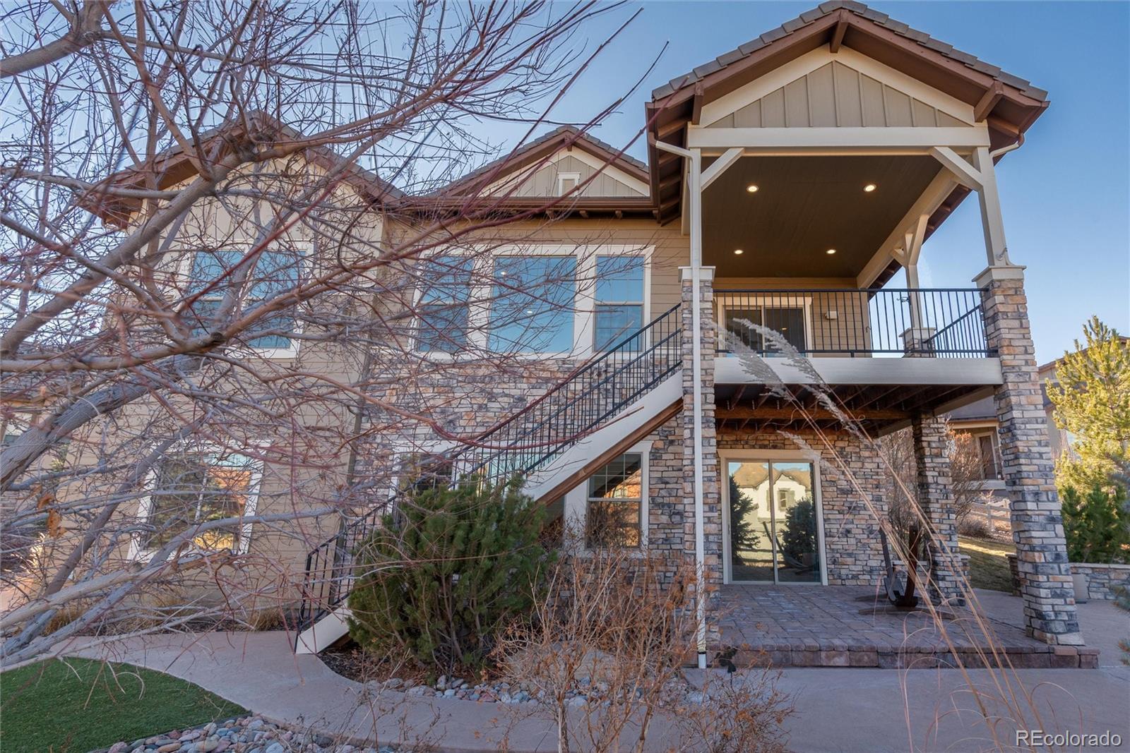 10698 Mountaingate Court Highlands Ranch, CO 80126 - Photo 40 of 47 a view of a house with a large windows