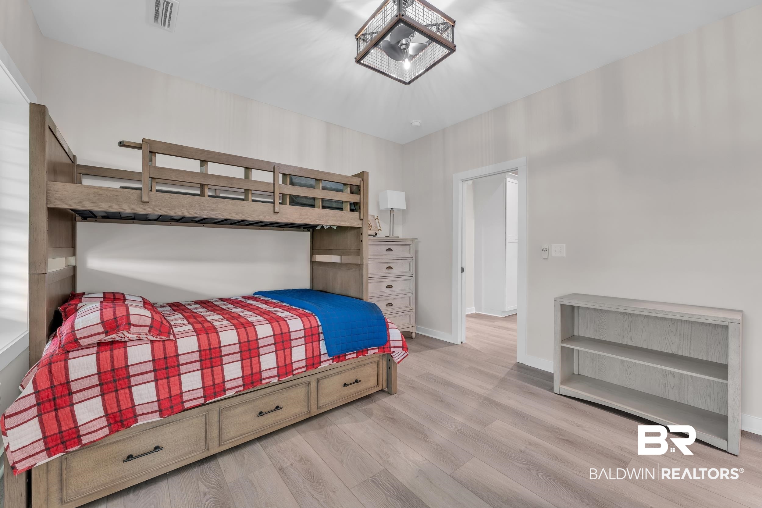 22592 Pastoral Lane Foley, AL 36535 - Photo 16 of 45 Bedroom with light wood-style floors and baseboards