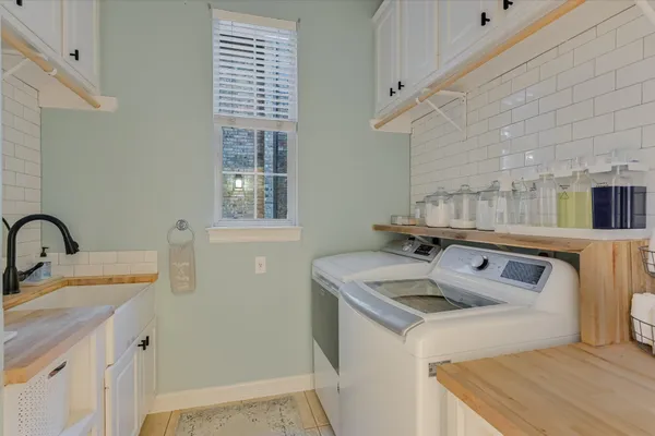a utility room with dryer and washer