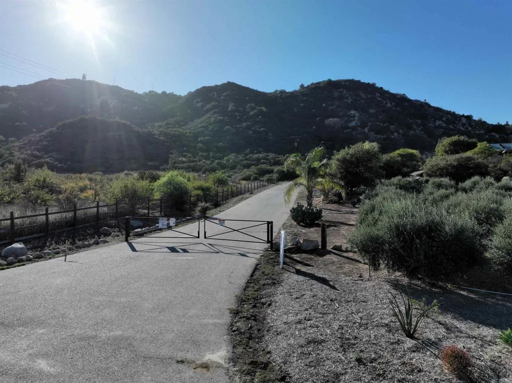 Rainbow Peaks Fallbrook, CA 92028 - Photo 1 of 48 a view of a house with a yard and mountain