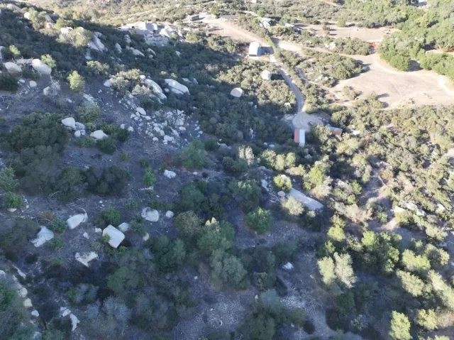 a backyard of a house with a mountain