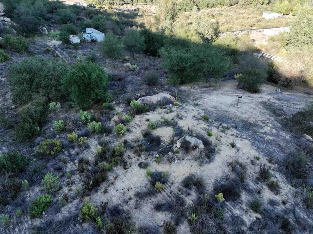 Rainbow Peaks Fallbrook, CA 92028 - Photo 33 of 48 a view of a dry field with lots of trees