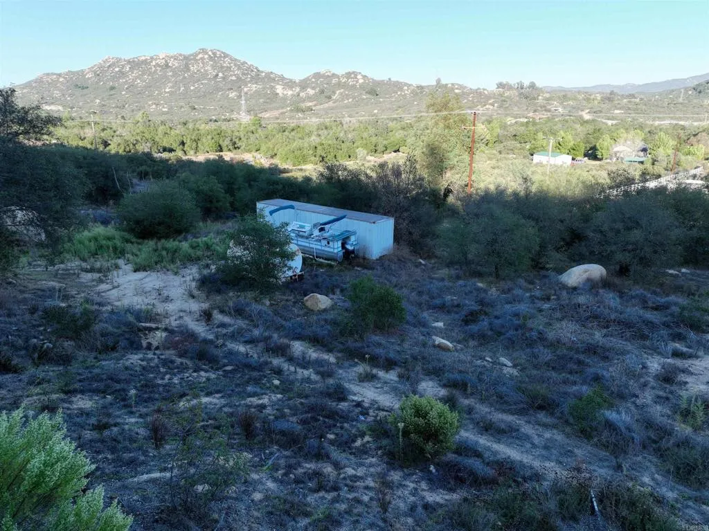 Rainbow Peaks Fallbrook, CA 92028 - Photo 40 of 48 a view of a town with mountains in the background