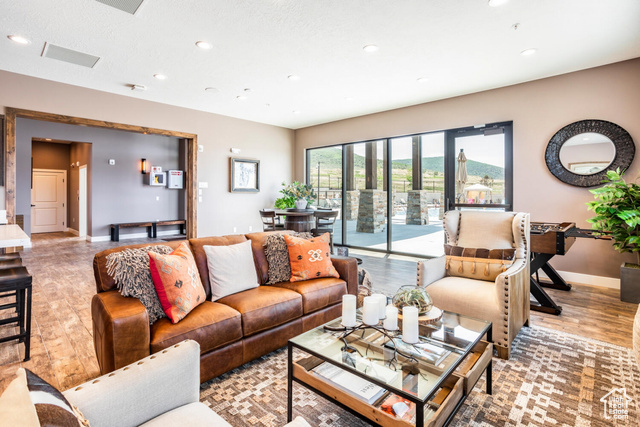 883 Wasatch View Drive, Unit 11 Kamas, UT 84036 - Photo 12 of 14 Living area featuring wood finished floors and recessed lighting