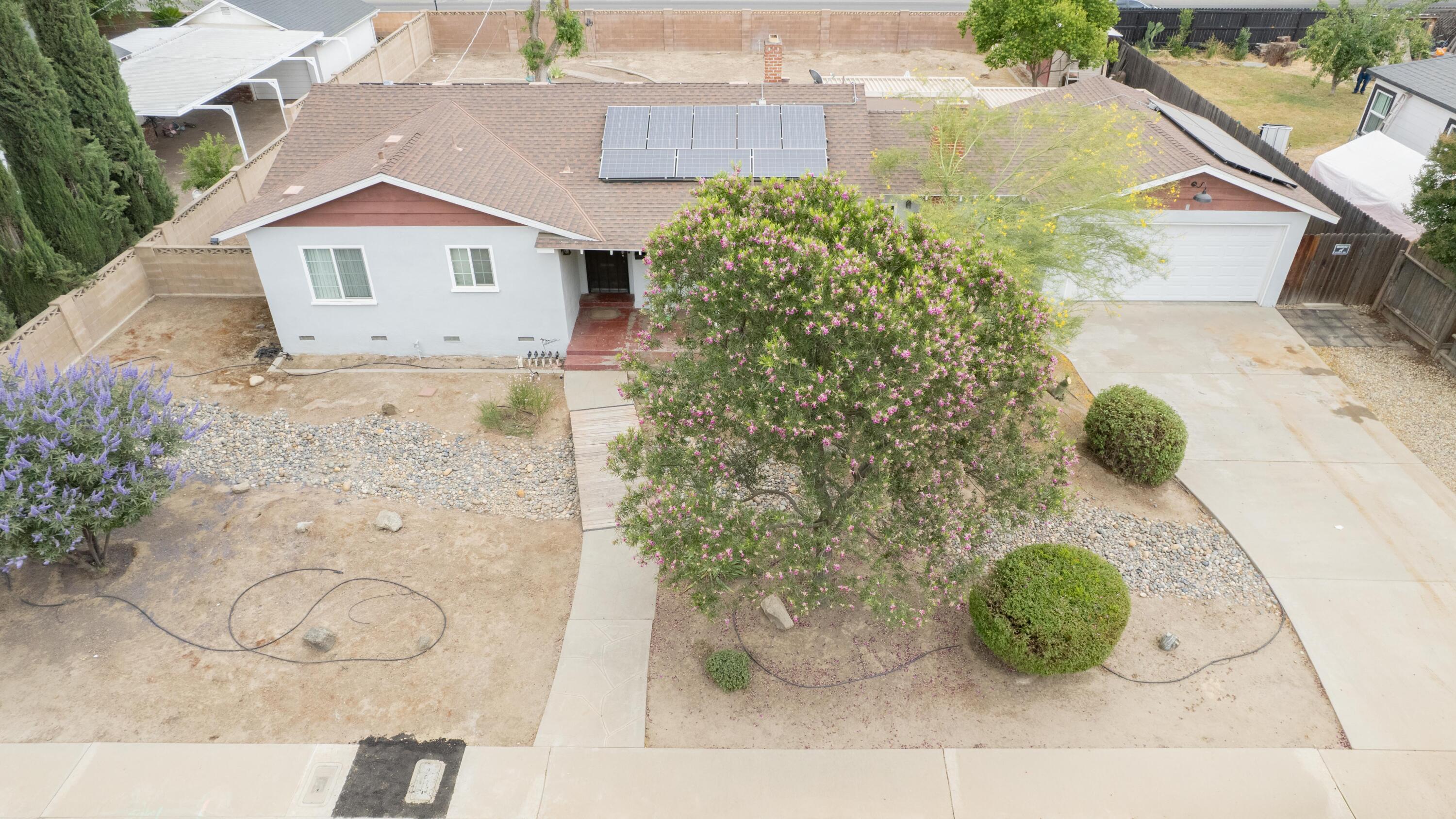 570 North Birch Avenue Reedley, CA 93654 - Photo 5 of 52 an aerial view of a house with a yard