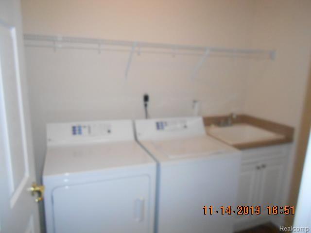3542 Oakmonte Boulevard, Unit 107 Rochester, MI 48306 - Photo 9 of 10 Laundry.jpg