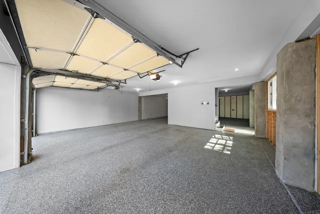 a view of a room with a fireplace