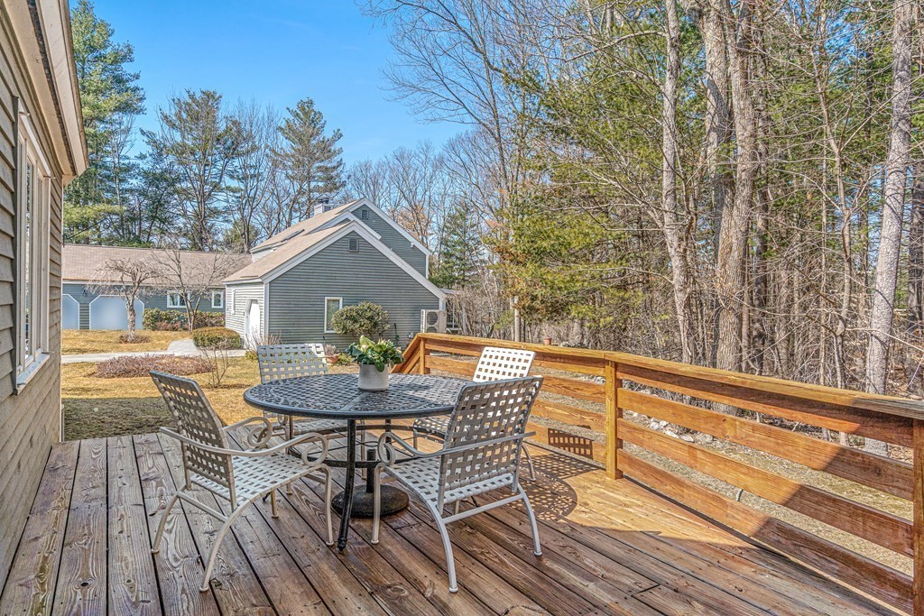 7 Coltsway, Unit 7 Wayland, MA 01778 - Photo 20 of 26 a view of a chairs and table on the balcony