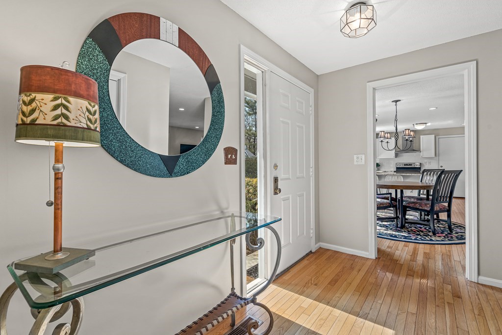 7 Coltsway, Unit 7 Wayland, MA 01778 - Photo 2 of 26 wooden floor in a livingroom