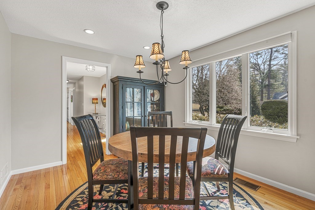 7 Coltsway, Unit 7 Wayland, MA 01778 - Photo 3 of 26 a view of a dining room with furniture window and wooden floor