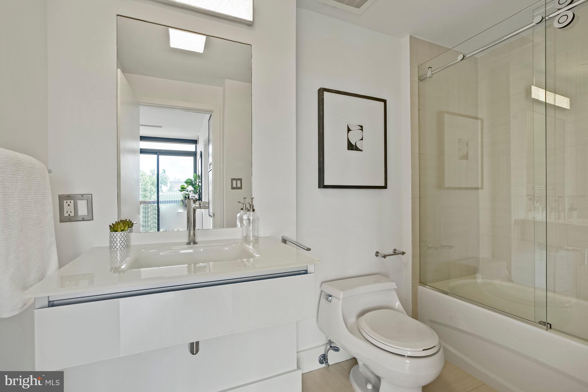 1401 Q Street Northwest, Unit 601 Washington, DC 20009 - Photo 15 of 30 Upper Level En-Suite Bathroom