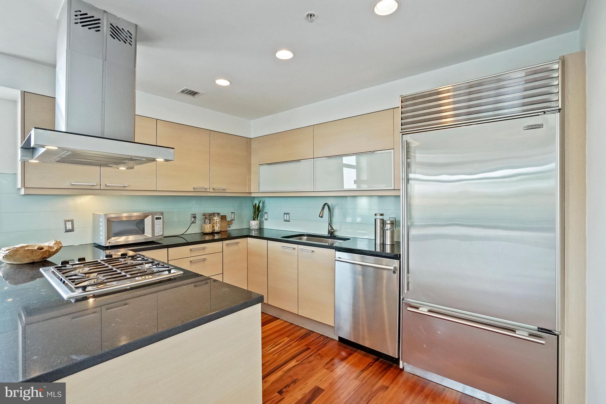 1401 Q Street Northwest, Unit 601 Washington, DC 20009 - Photo 6 of 30 Kitchen with Sub Zero and Bosch Stainless Applianc