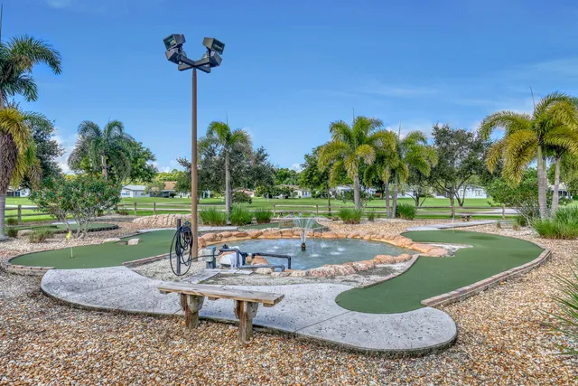 a view of a yard and a patio