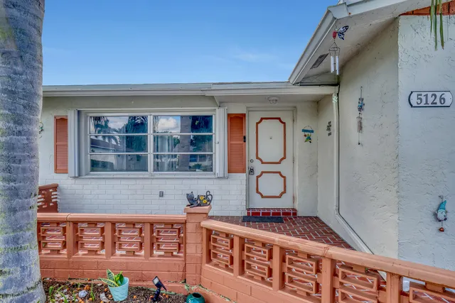 a front view of a building with glass windows