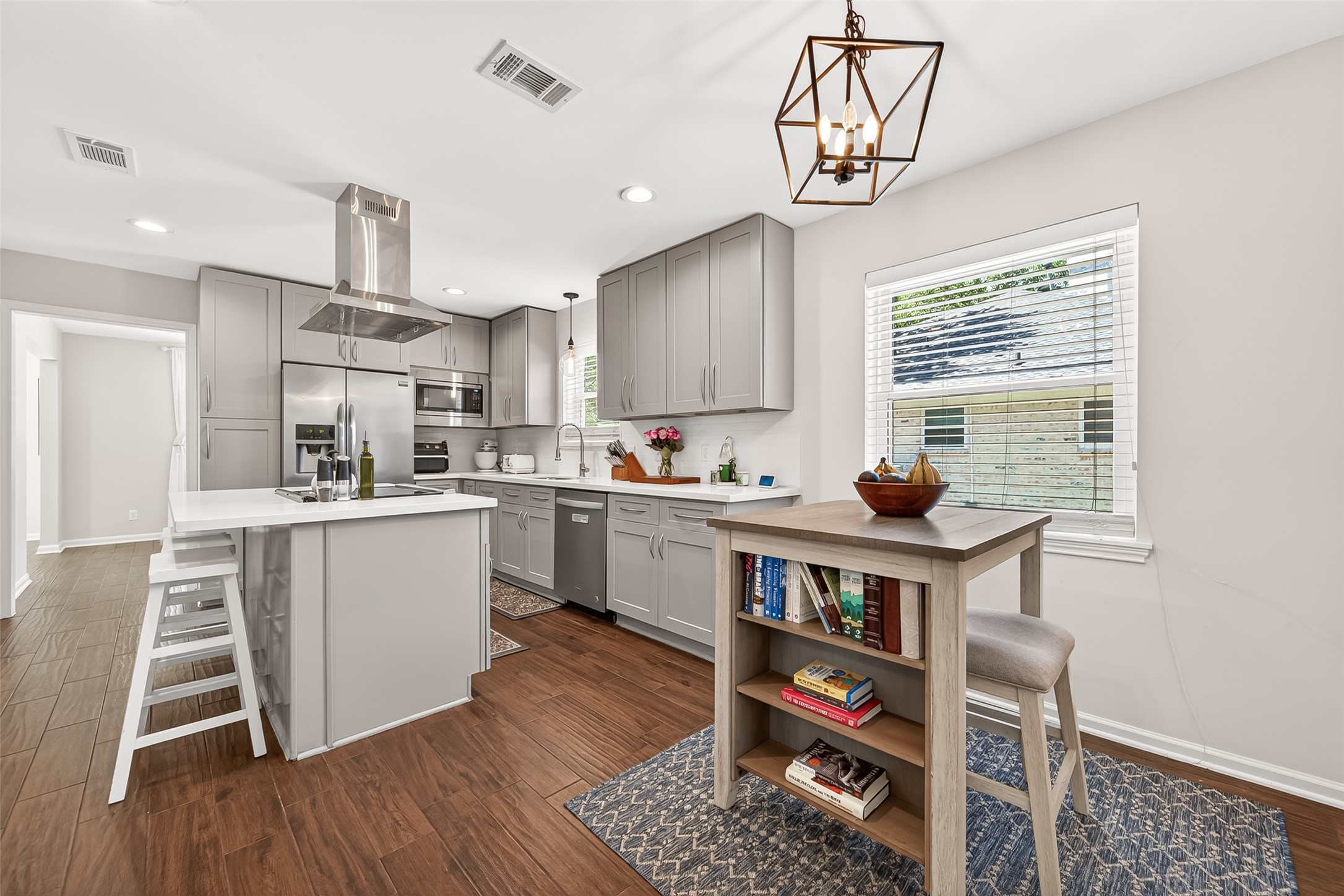 2610 Teague Road Houston, TX 77080 - Photo 30 of 49 Breakfast nook off the kitchen with beautiful light fixture.